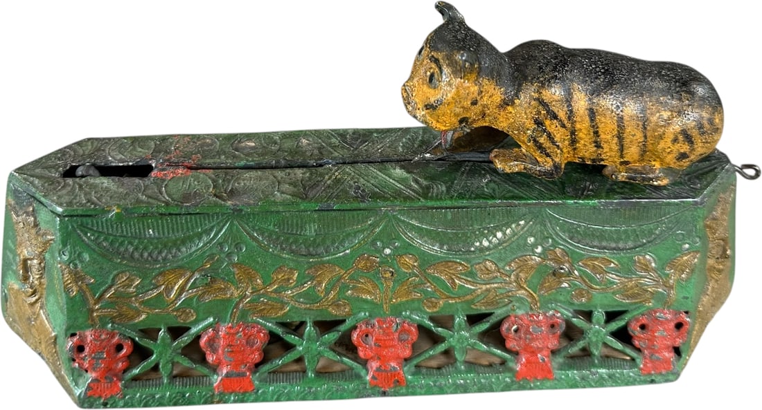 SPRINGING CAT MECHANICAL BANK: 14. SPRINGING CAT MECHANICAL BANK | Mfg. by Charles A. Bailey, circa 1882, as it is made of a pliable lead these hand painted banks can easily be damaged and are quite rare, to operate place coin in s