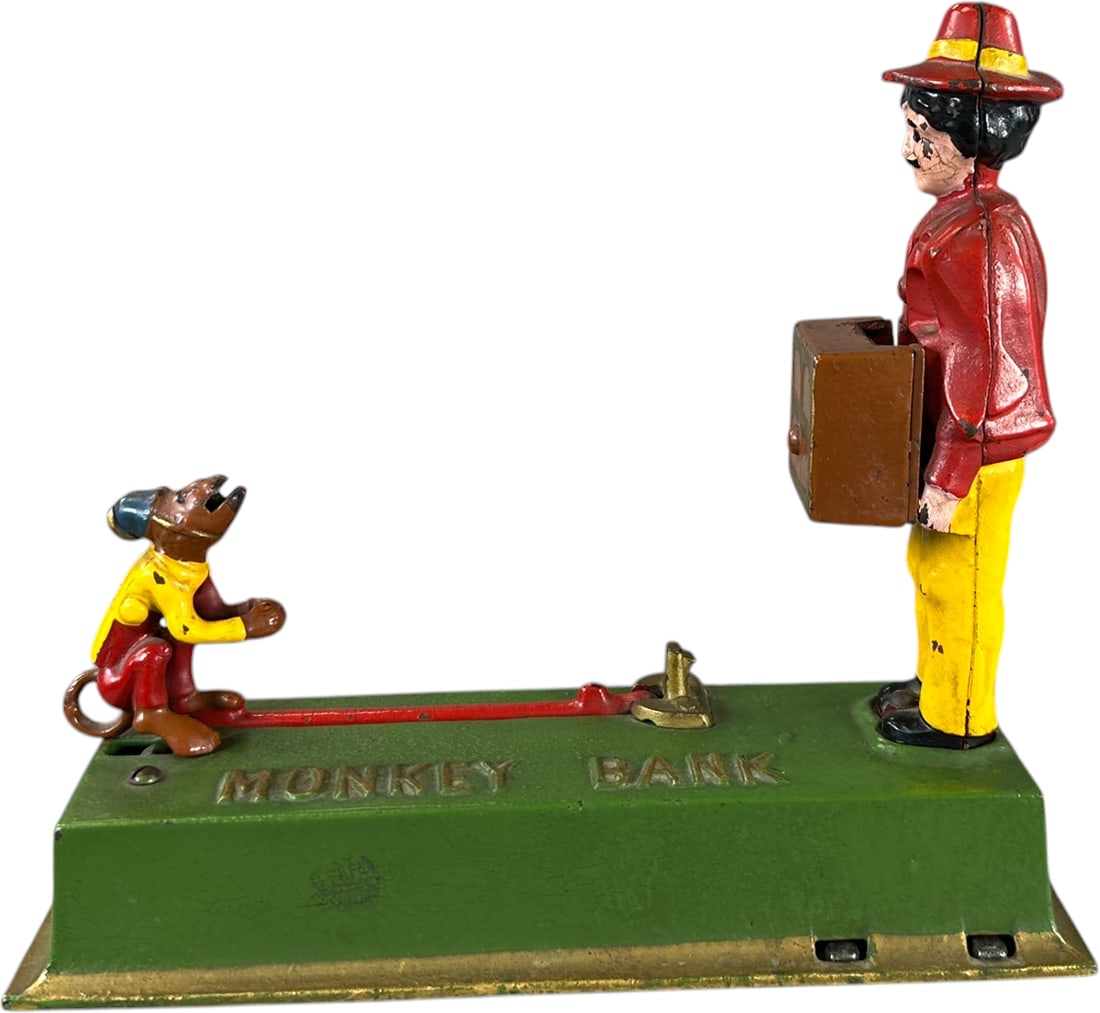 TRICK MONKEY MECHANICAL BANK: 53. TRICK MONKEY MECHANICAL BANK | Hubley Mfg., Lancaster, PA. Provenance: The Robert Booth Jr. Collection. | 9" l. | With a little polish this would be brilliant, (Pristine to Near Mint Condition) |