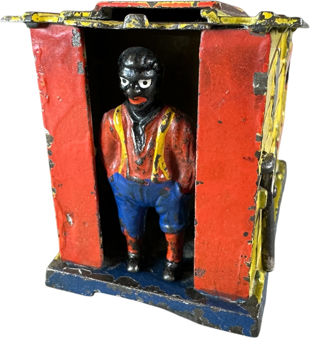 CABIN MECHANICAL BANK: 67. CABIN MECHANICAL BANK | J&E Stevens Co. Provenance: The Robert Booth Jr. Collection. | CULTURAL DISCLAIMER: Certain antique and vintage items in this sale include imagery or themes that reflect ra