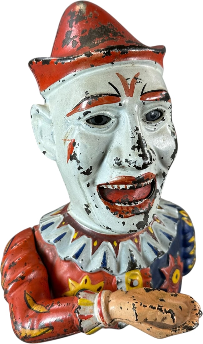 HUMPTY DUMPTY MECHANICAL BANK: 68. HUMPTY DUMPTY MECHANICAL BANK | Shepard Hardware Co. Provenance: The Robert Booth Jr. Collection. | 9" h. | Expected amount of wear for such a popular bank, screw on base is replaced, (Excellent C