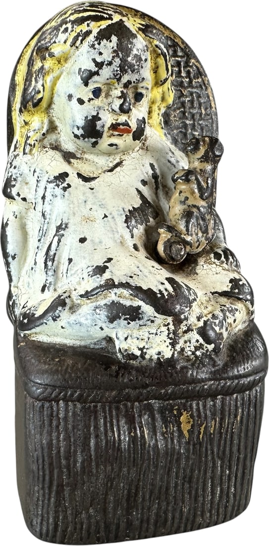 GIRL IN VICTORIAN CHAIR MECHANICAL BANK: 72. GIRL IN VICTORIAN CHAIR MECHANICAL BANK | Mfg. Reed Toy Co. Provenance: The Robert Booth Jr. Collection. | 5" h. | (Very Good to Excellent Condition) for this scarce bank. | $1,000 - $1,500