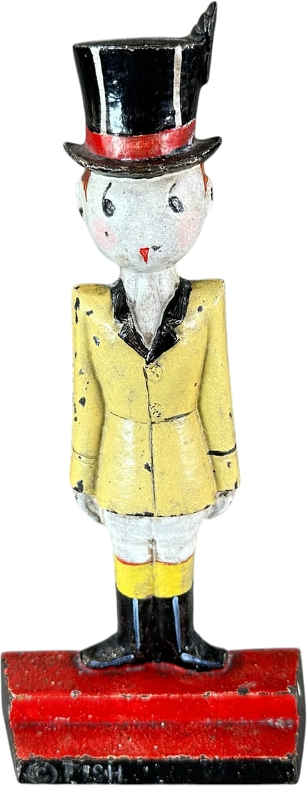 HUBLEY THE TIGER DOORSTOP: 116. HUBLEY THE TIGER DOORSTOP | One of six in a series designed and signed "? Fish, 269", a familiar and classic stylized deco doorstop in yellow uniform w/black top hat, the rarest of the Fish