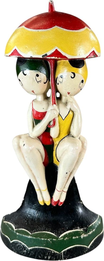 HUBLEY BATHING BEAUTIES DOORSTOP: 118. HUBLEY BATHING BEAUTIES DOORSTOP | One of a series of six designed and signed "? FISH 250", extremely popular deco design, depicts two young ladies in bathing gear sharing a parasol, one of the