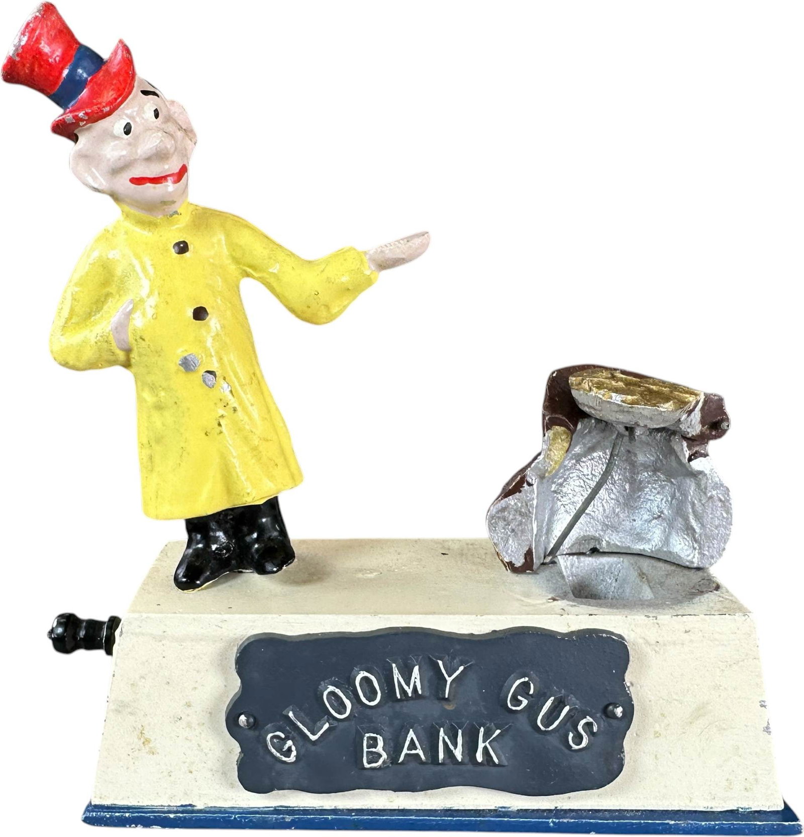 REYNOLDS GLOOMY GUS MECHANICAL BANK: 160. REYNOLDS GLOOMY GUS MECHANICAL BANK | Catalogue # 18-M, 1974, Edition of 19. Ex: Max Berry Collection. | 6.5" l. | Front half of his money bag is missing, otherwise (Excellent Condition) | $150 -
