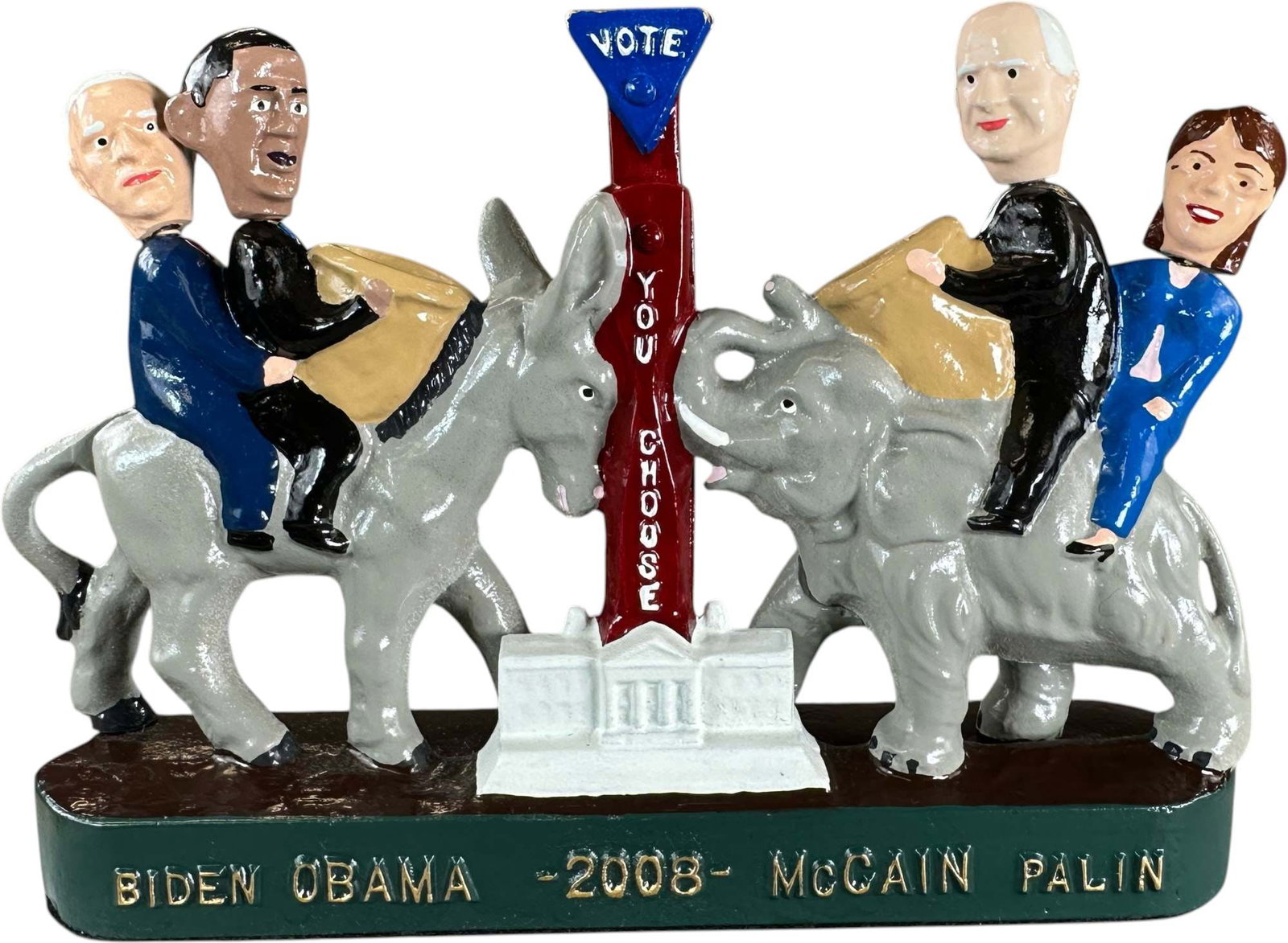 REYNOLDS OBAMA MCCAIN MECHANICAL BANK: 168. REYNOLDS OBAMA MCCAIN MECHANICAL BANK | "You Choose", Catalogue # 74-M, 2008, Edition 2 of 35. Ex: Max Berry Collection. | 10.5" l. | (Near Mint Condition) | $300 - $600