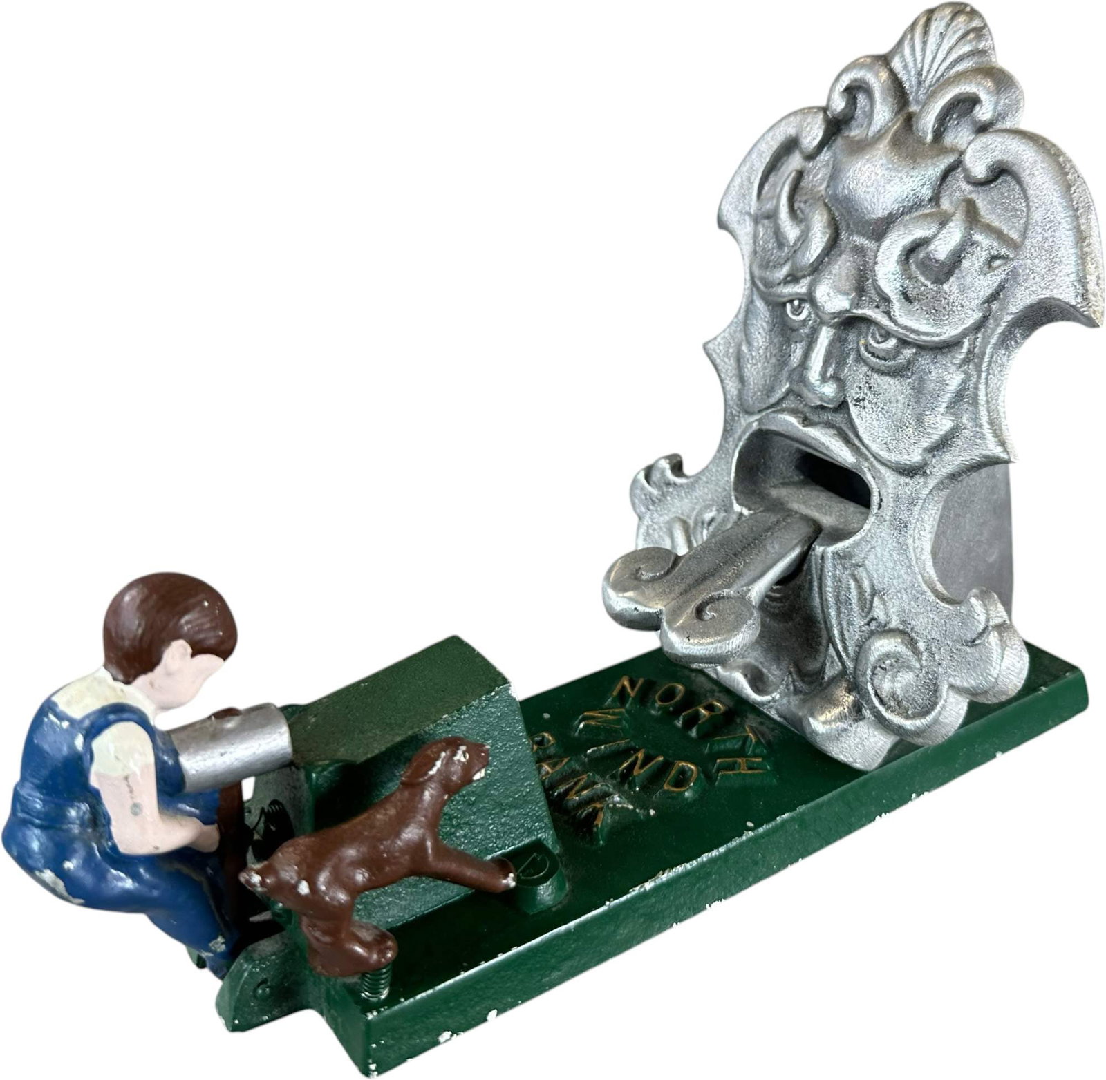 REYNOLDS NORTH WIND MECHANICAL BANK: 204. REYNOLDS NORTH WIND MECHANICAL BANK | Catalogue # 37-M, 1980, Edition 2 of 30 Ex: Max Berry Collection. | 9" l. | (Excellent Condition) | $150 - $300