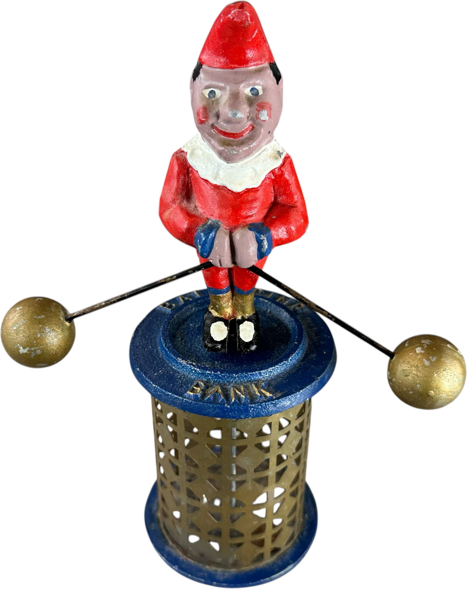 REYNOLDS THE BALANCING MECHANICAL BANK: 213. REYNOLDS THE BALANCING MECHANICAL BANK | Catalogue # 8-M, 1972, Edition 2 of 10. Ex: Max Berry Collection. | 9.5" h. | (Excellent Condition) | $200 - $300