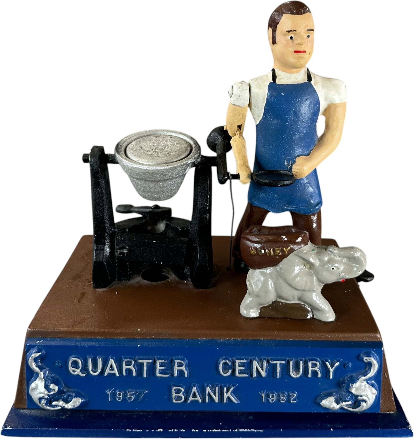 REYNOLDS QUARTER CENTURY MECHANICAL BANK: 219. REYNOLDS QUARTER CENTURY MECHANICAL BANK | Catalogue # 39-M, 1982, Edition 2 of 25. Ex: Max Berry Collection. | 9" l. | (Excellent Condition) | $600 - $1,000