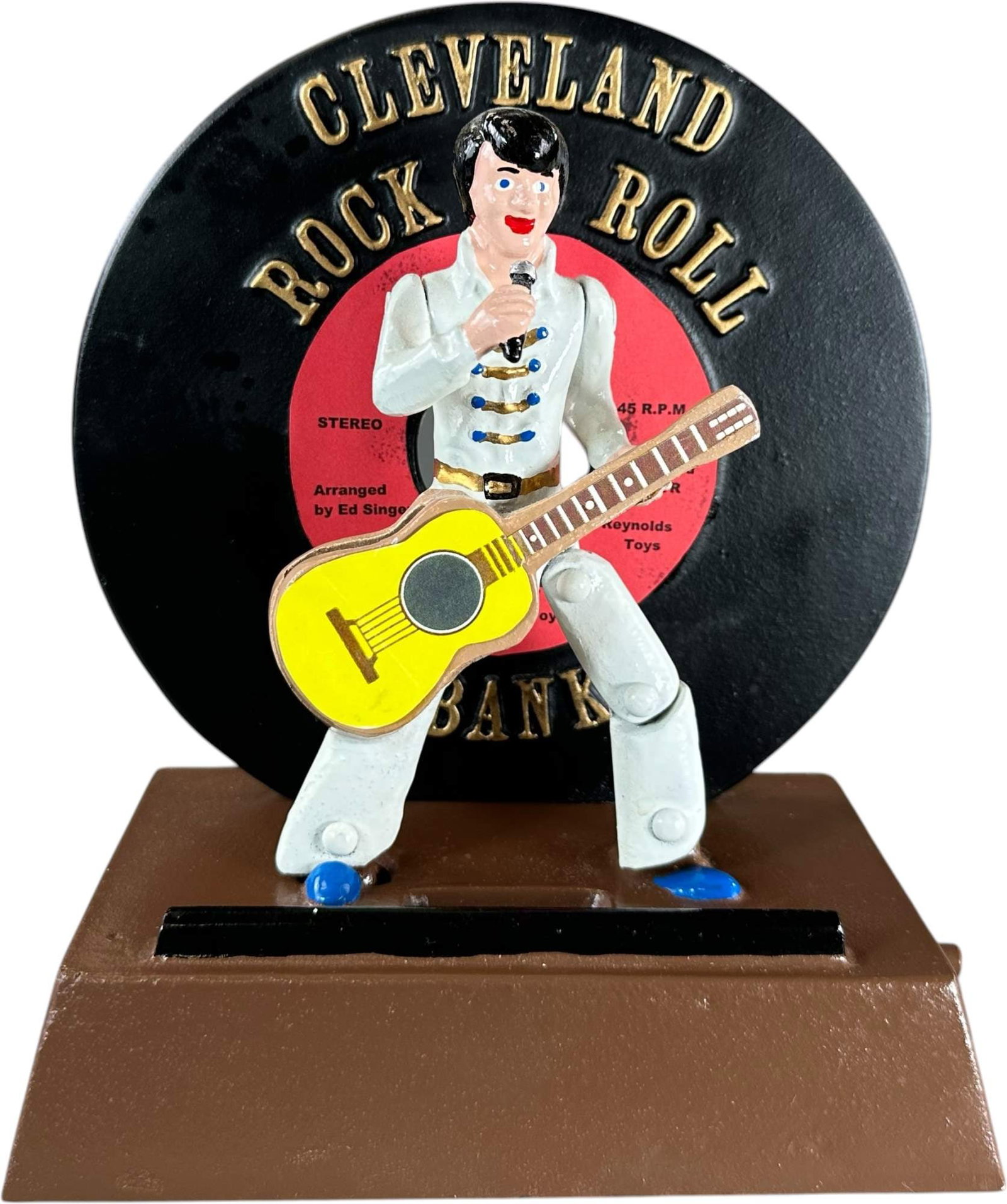 REYNOLDS CLEVELAND ROCK AND ROLL MECHANICAL BANK: 223. REYNOLDS CLEVELAND ROCK AND ROLL MECHANICAL BANK | Catalogue # 72-M, 2006, Edition 2 of 50. Ex: Max Berry Collection. | 7" l. | (Near Mint Condition) | $300 - $400