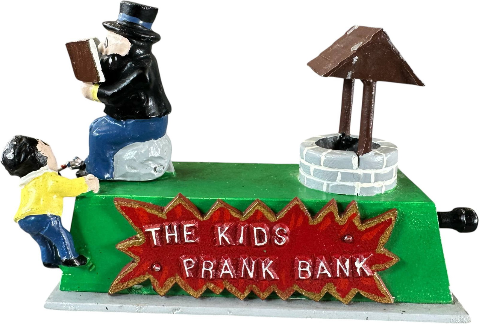 REYNOLDS KIDS PRANK BANK MECHANICAL BANK: 255. REYNOLDS KIDS PRANK BANK MECHANICAL BANK | Catalogue # 19-M, 1974, Edition of 10. Ex: Max Berry Collection. | 6.5" l. | Missing kid on roof, some oxidation to rear of bank, (Very Good to Excellen