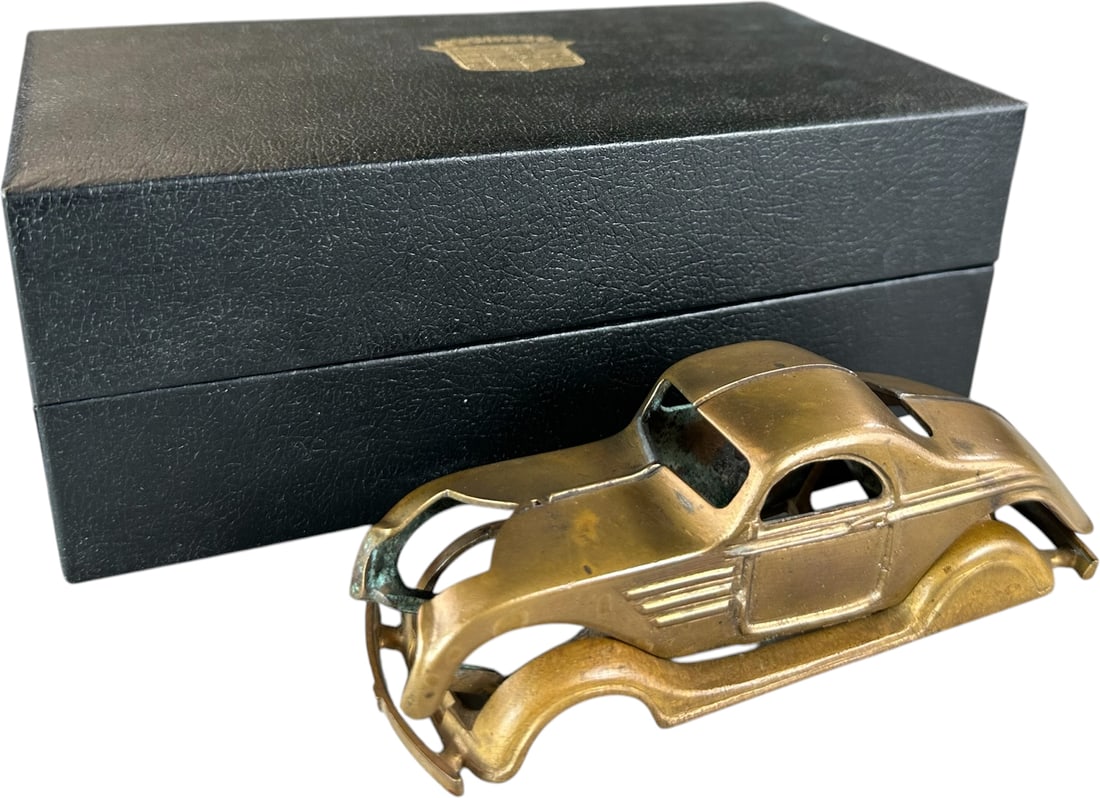 DENT 1934 CHRYSLER AIRFLOW BRASS PATTERN: 269. DENT 1934 CHRYSLER AIRFLOW BRASS PATTERN | Provenance: Ira Bernstein Collection. | 5" l. | (Excellent Condition) | $800 - $1,600