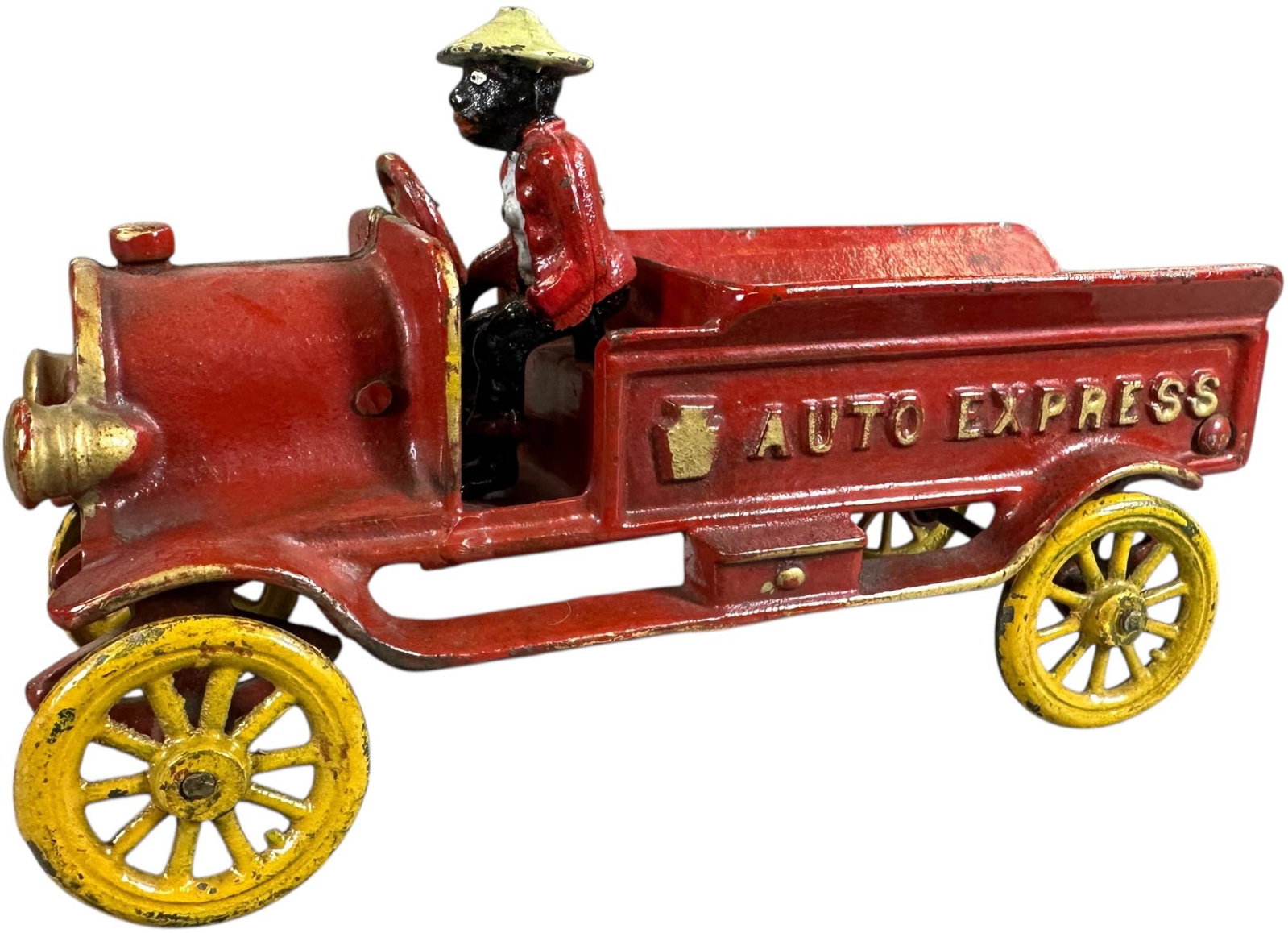 HUBLEY EARLY AUTO EXPRESS TRUCK: 310. HUBLEY EARLY AUTO EXPRESS TRUCK | CULTURAL DISCLAIMER: Certain antique and vintage items in this sale include imagery or themes that reflect racial stereotypes now recognized as offensive. These