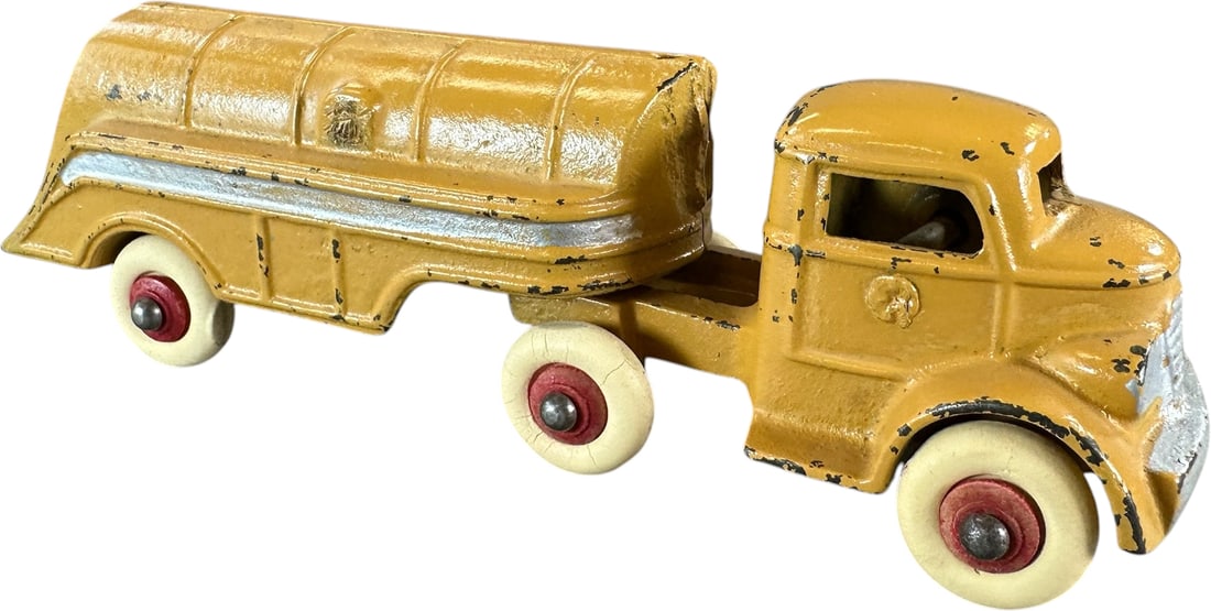 SCARCE KENTON GASOLINE TANKER TRUCK: 398. SCARCE KENTON GASOLINE TANKER TRUCK | The last one we handled was in the Kaufman Collection. Provenance: Ira Bernstein Collection. | 7" l. | Overpainted, (Excellent Condition) | $300 - $400