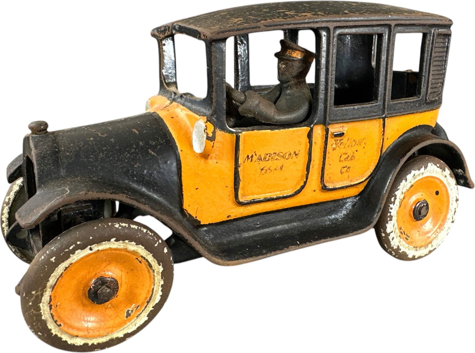 ARCADE YELLOW CAB TAXI: 406. ARCADE YELLOW CAB TAXI | Ex: Tony Lasala Collection. | 8" l. | Cracks at spare glued, (Very Good Condition) | $100 - $200