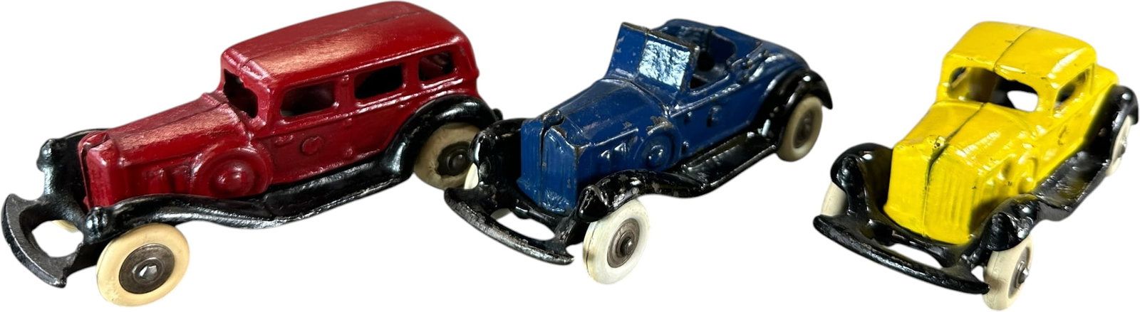 THREE AC WILLIAMS TAKE APART AUTOS: 423. THREE AC WILLIAMS TAKE APART AUTOS | Provenance: Ira Bernstein Collection. | 4.5" l. | Yellow fenders have edge touch-ups, red car is restored, (Very Good to Excellent Condition) | $250 - $500