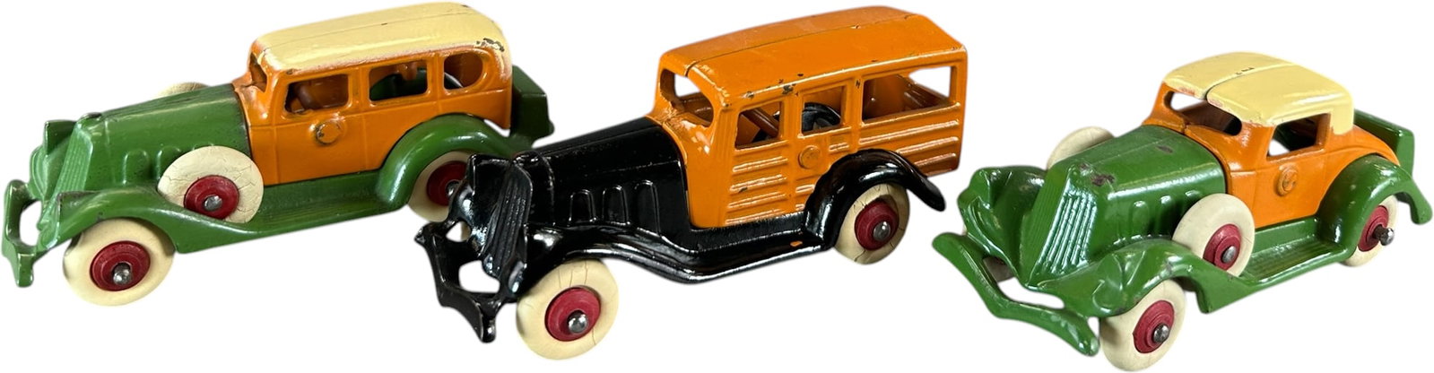 THREE COLORFUL HUBLEY AUTOMOBILES: 431. THREE COLORFUL HUBLEY AUTOMOBILES | Provenance: Ira Bernstein Collection. | 5" l. | (Excellent to Pristine Condition) | $250 - $500