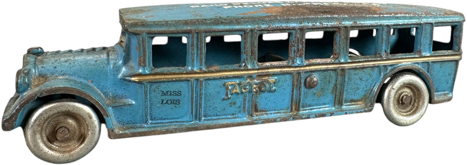 ARCADE DAILY DELUXE FAGEOL COACH: 438. ARCADE DAILY DELUXE FAGEOL COACH | Door stenciled "Miss Lois". Ex: Tony Lasala Collection. | 8.5" l. | Original private roof stencil with one roof section worn, (Very Good Condition) | $200 - $40