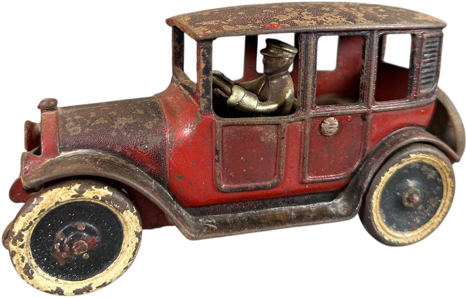 HUBLEY TWO TONE RED TAXI CAB: 443. HUBLEY TWO TONE RED TAXI CAB | Ex: Tony Lasala Collection. | 7.5" l. | Original wheels with replaced spare, re-peened, original paint (Very Good Condition) | $300 - $400