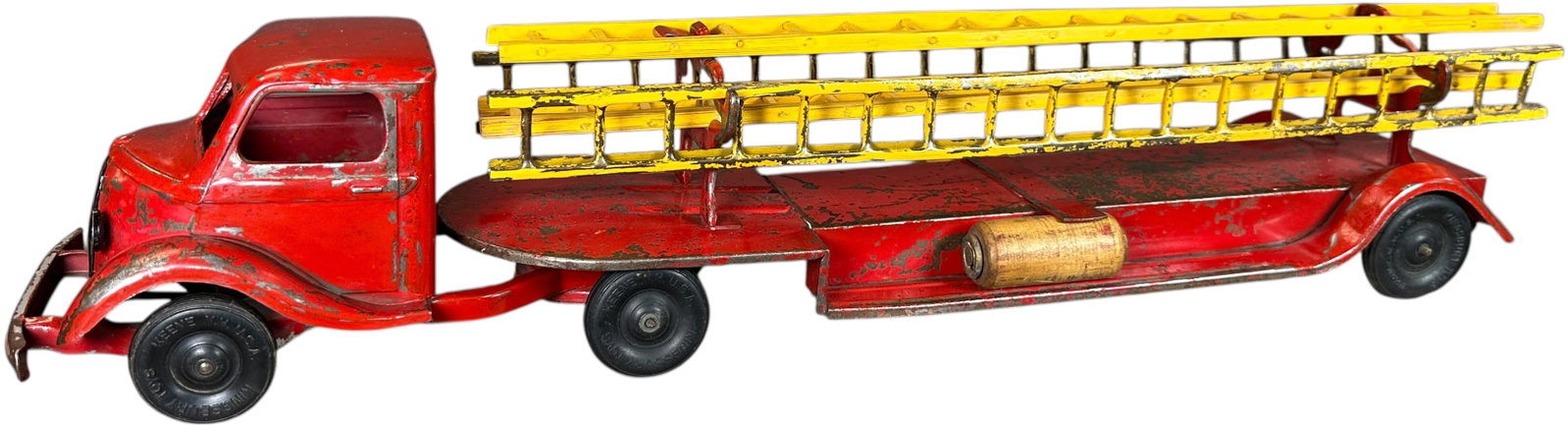 KINGSBURY STUDEBAKER FIRE LADDER TRUCK: 466. KINGSBURY STUDEBAKER FIRE LADDER TRUCK | 25" l. | Two ladders replaced, cab has repaint in areas, some minor touch-up at two rear fenders and at ladder brackets/holders, (Very Good Condition) |