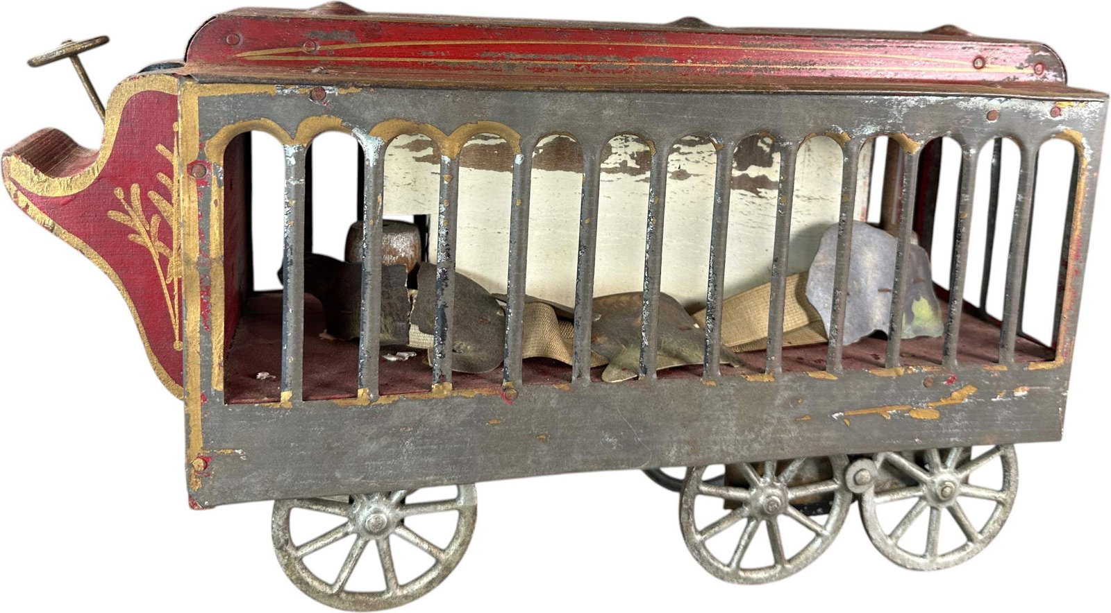 DAYTON HILLCLIMBER CIRCUS WAGON: 487. DAYTON HILLCLIMBER CIRCUS WAGON | 17" l. | Toy could use some TLC, tightening of the elastic ban, (Very Good Condition) | $200 - $300