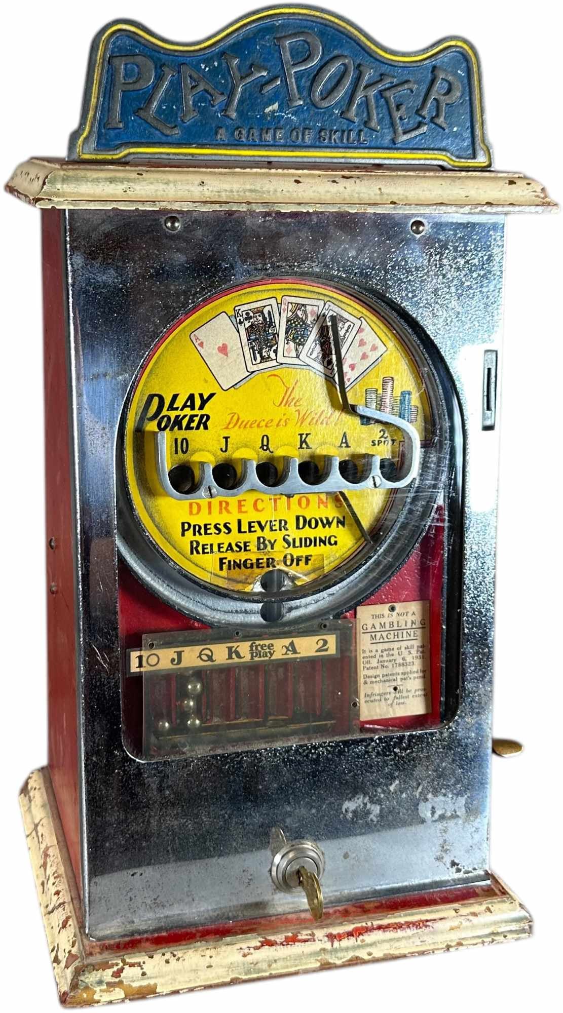 PLAY-POKER COUNTER SKILL GAME: 9. PLAY-POKER COUNTER SKILL GAME | coin-operated countertop skill game, featuring a circular playing field with card values and six scoring pockets corresponding to poker hands, the colorful dial