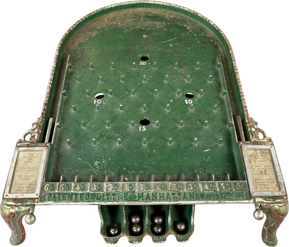 EARLY MANHATTAN POOL TABLE GAME: 11. EARLY MANHATTAN POOL TABLE GAME | tabletop pin-and-ball game, patented March 12, 1901, playing field use a dense arrangement of pins and numbered scoring pockets, with six shots allotted to each