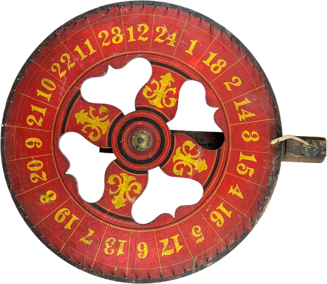 EARLY TABLETOP ROULETTE GAME: 13. EARLY TABLETOP ROULETTE GAME | Painted wooden roulette wheel/table game, with numbered red playing field and central rotating wheel, retains its side-mounted operating mechanism. An attractive