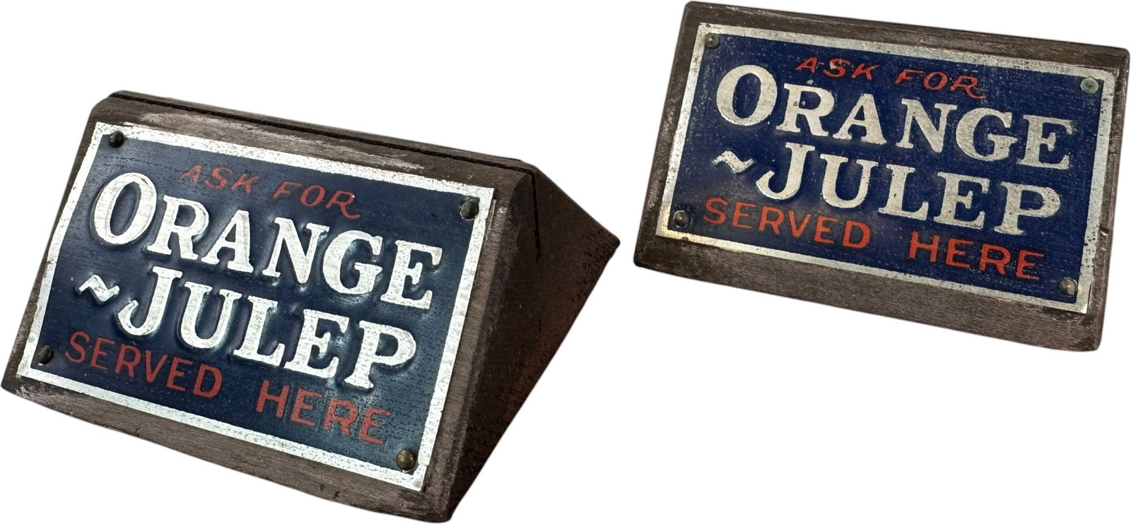 TWO ORANGE JULEP SODA FOUNTAIN MENU HOLDERS: 49. TWO ORANGE JULEP SODA FOUNTAIN MENU HOLDERS | 4" l. | (Excellent Condition) | $200 - $400