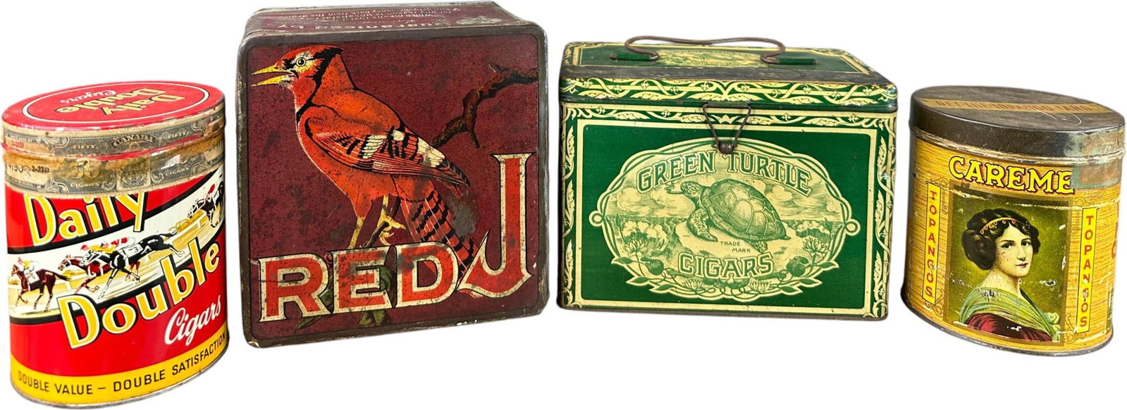 LOT OF FOUR VINTAGE CIGAR TINS: 131. LOT OF FOUR VINTAGE CIGAR TINS | Including Daily Double Cigars, with horse racing graphics; Red J, featuring a large bird illustration; Green Turtle Cigars, with carrying handle; and Careme Topan