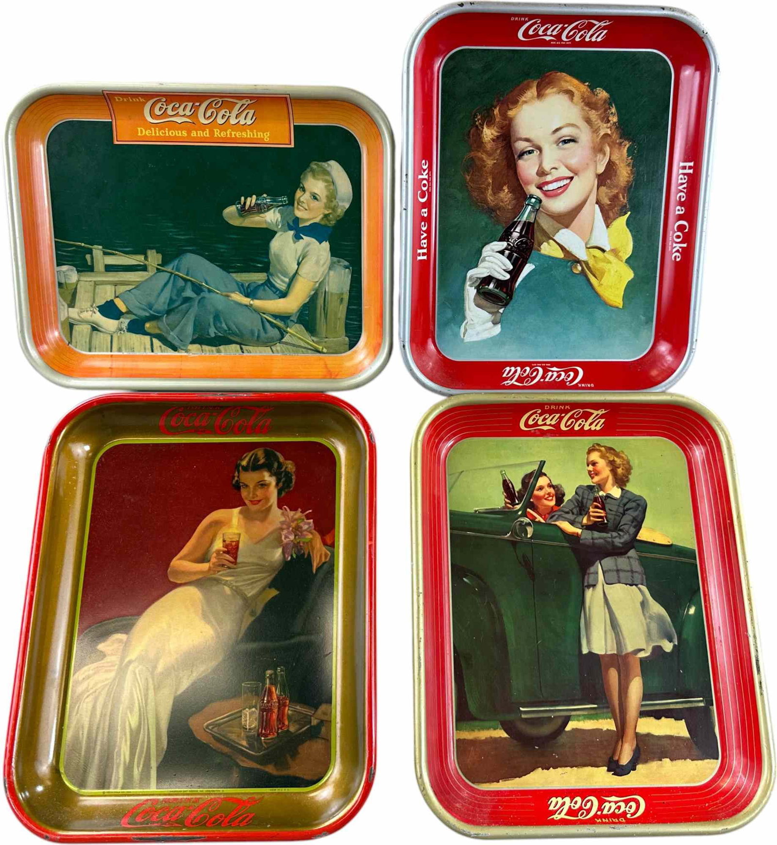 1936, 40, 42, 48 COCA COLA TRAYS: 159. 1936, 40, 42, 48 COCA COLA TRAYS | 13" l. | (Excellent Condition) | $200 - $400