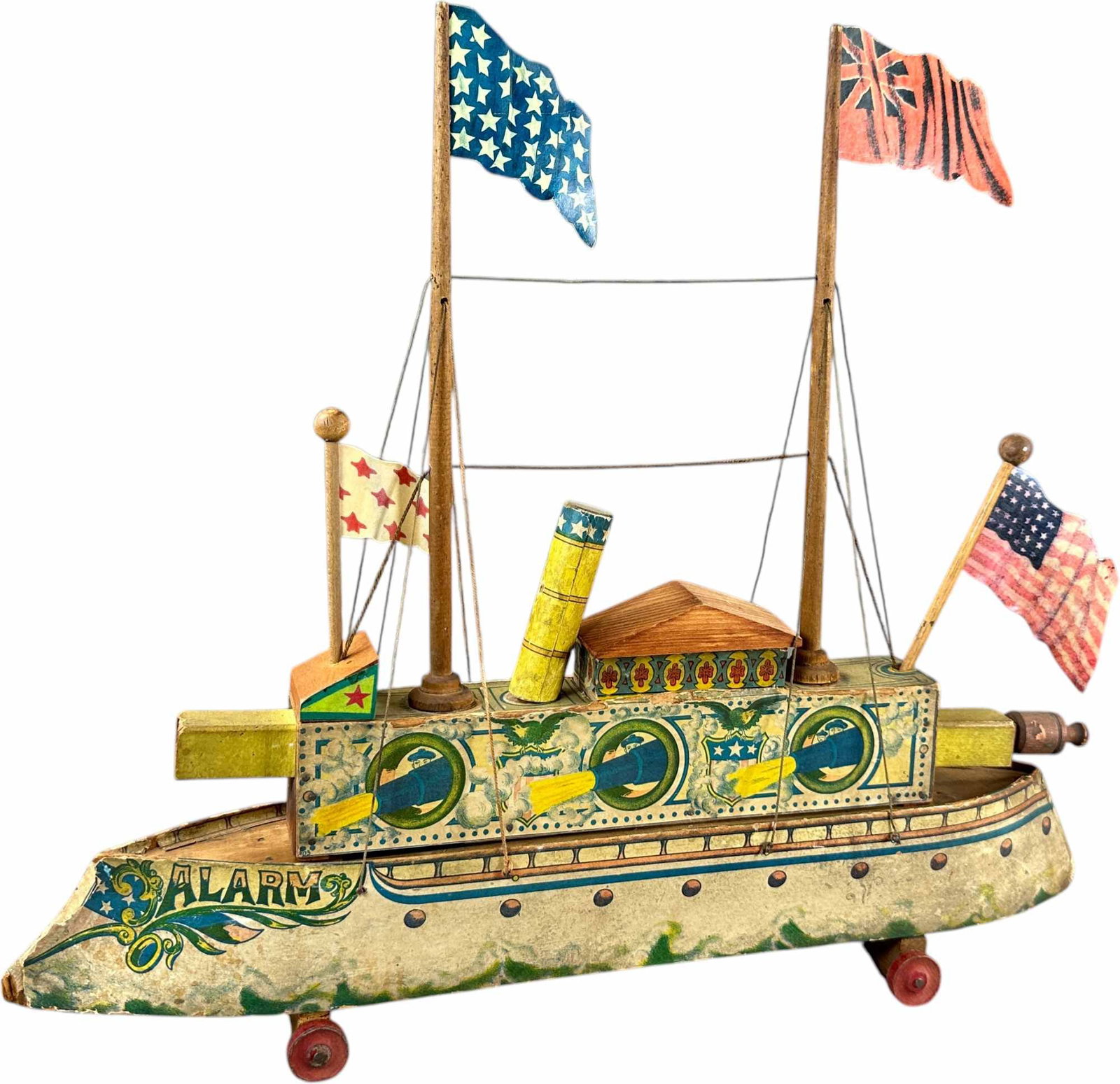 BLISS ALARM FIRING CANNON BATTLESHIP: 176. BLISS ALARM FIRING CANNON BATTLESHIP | Very visual lithography on this firing cannon boat! Provenance: Richard Mueller Collection. | Given the age and inherently fragile nature of these paper-lit