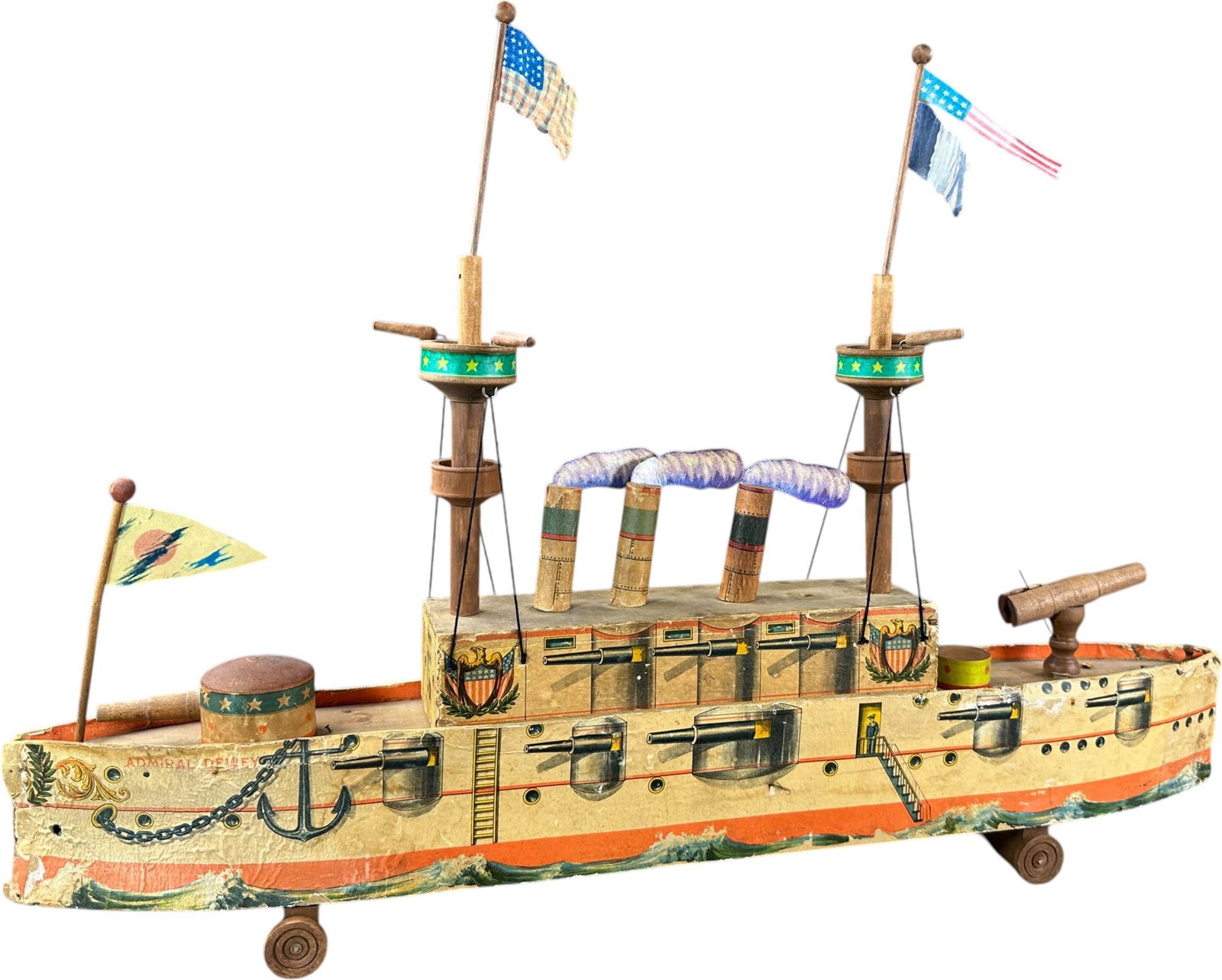 REED BATTLESHIP ADMIRAL DEWEY: 190. REED BATTLESHIP ADMIRAL DEWEY | Provenance: Richard Mueller Collection. | Given the age and inherently fragile nature of these paper-lithographed wood toys, staining, tears, repairs, restoration,