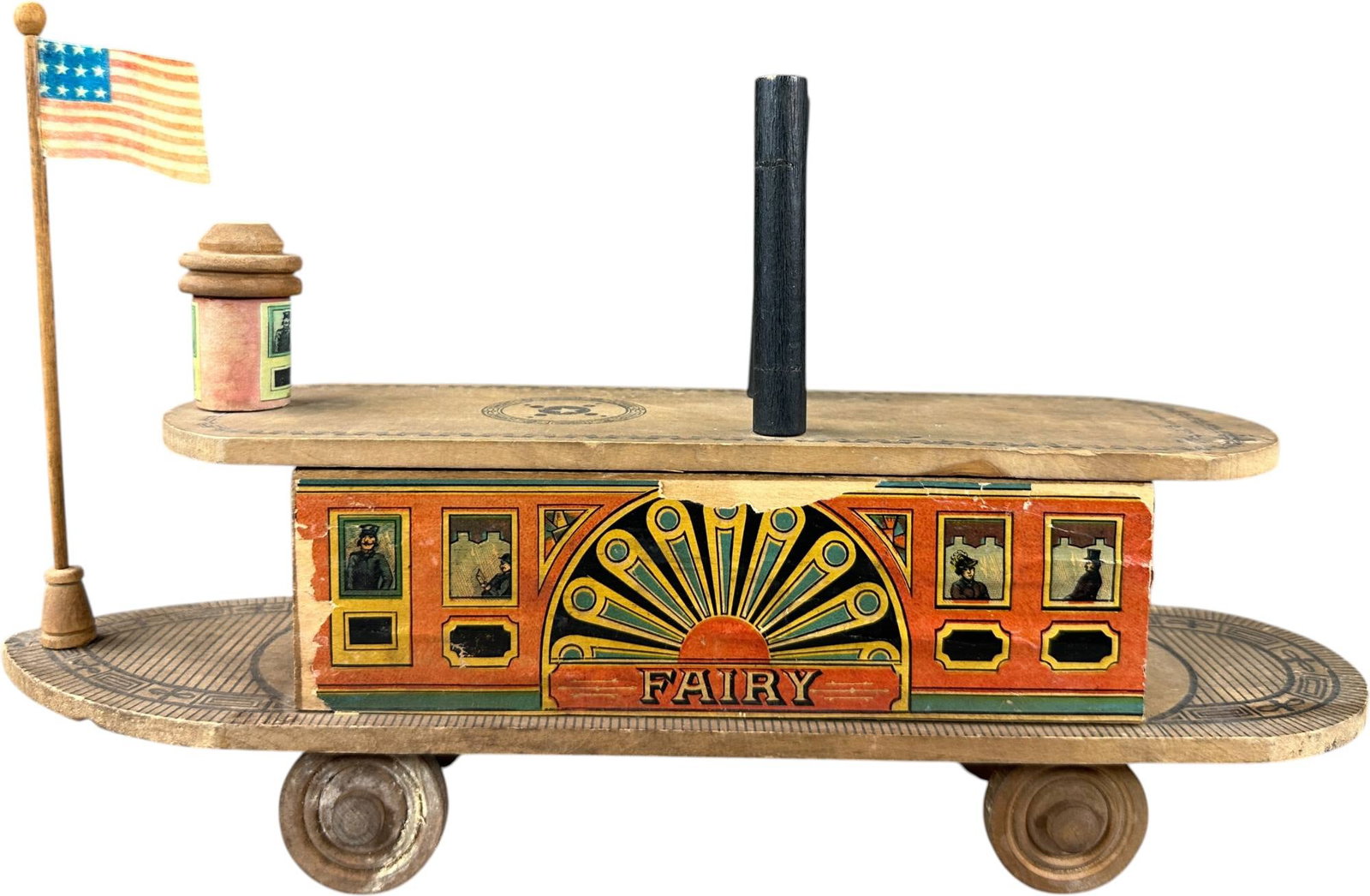 REED FAIRY FERRY BOAT: 197. REED FAIRY FERRY BOAT | Provenance: Richard Mueller Collection. | Given the age and inherently fragile nature of these paper-lithographed wood toys, staining, tears, repairs, restoration, and occ