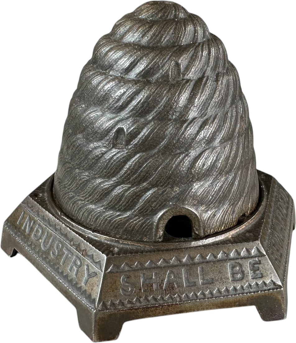 ENGLISH BEEHIVE STILL BANK: 364. ENGLISH BEEHIVE STILL BANK | Harper, England, a detailed example with "Industry shall be rewarded" around base. | 5" h. | (Excellent to Pristine Condition) | $600 - $800