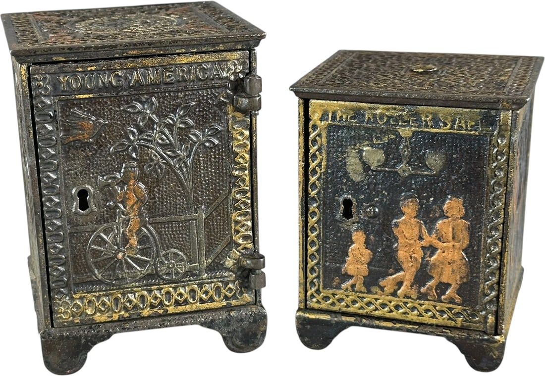 YOUNG AMERICA & ROLLER SAFE STILL BANKS: 376. YOUNG AMERICA & ROLLER SAFE STILL BANKS | Kyser & Rex, c. 1882. | 4.5" h. | Young America in (Excellent Condition), Roller Safe in (Pristine Condition) | $200 - $400
