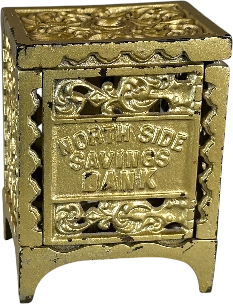 NORTH SIDE SAVINGS SAFE STILL BANK: 377. NORTH SIDE SAVINGS SAFE STILL BANK | Kenton, scarce example. | 3.5" h. | Overpainted gold, (Very Good to Excellent Condition) | $250 - $500