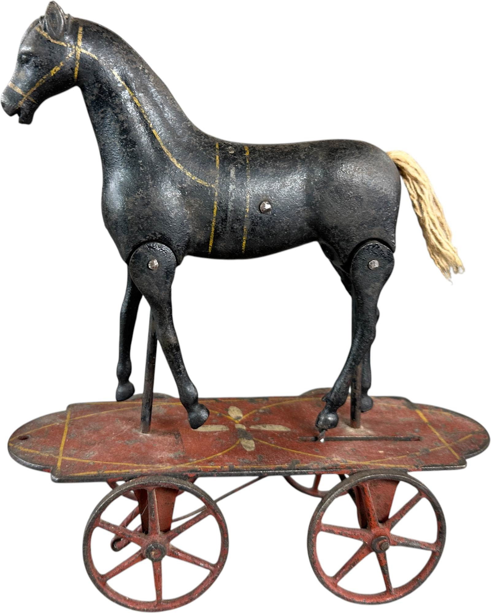 IVES WALKING HORSE ON PLATFORM: 386. IVES WALKING HORSE ON PLATFORM | 9" l. | A good cleaning could improve the overall appearance, (Very Good Condition) | $800 - $1,400