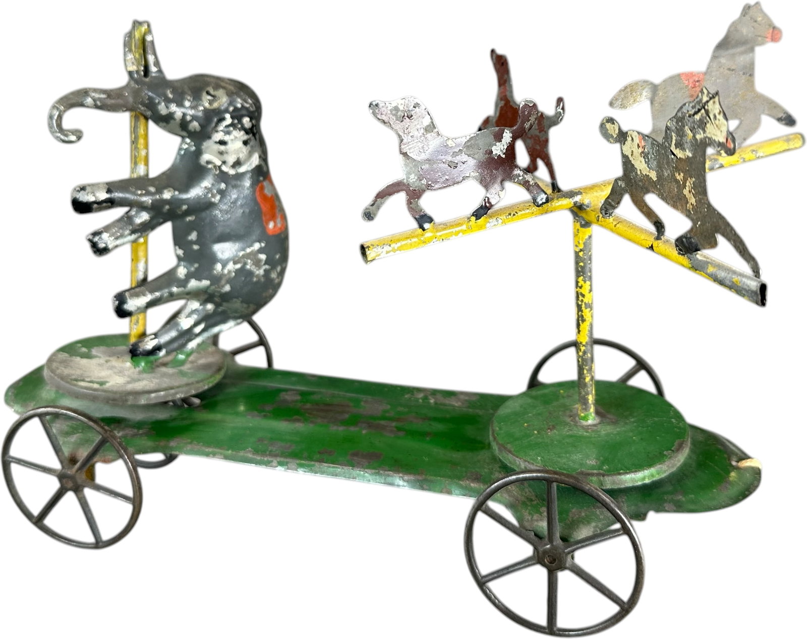 CIRCUS ANIMALS ON PLATFORM: 399. CIRCUS ANIMALS ON PLATFORM | Attributed to Merriam. Provenance: The Max Berry Collection #976. | 10" l. | One dog figure is replaced, (Excellent Condition) | $800 - $1,600