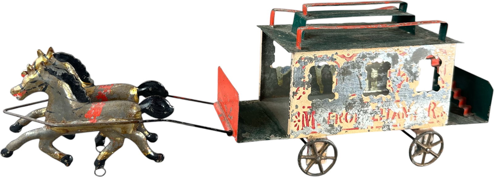 HORSE DRAWN OMNIBUS: 405. HORSE DRAWN OMNIBUS | Provenance: The Max Berry Collection #665. | 13.5" l. | Flaking to sides of wagon as can be expected. Overall (Very Good Condition) considering the age. | $400 - $800