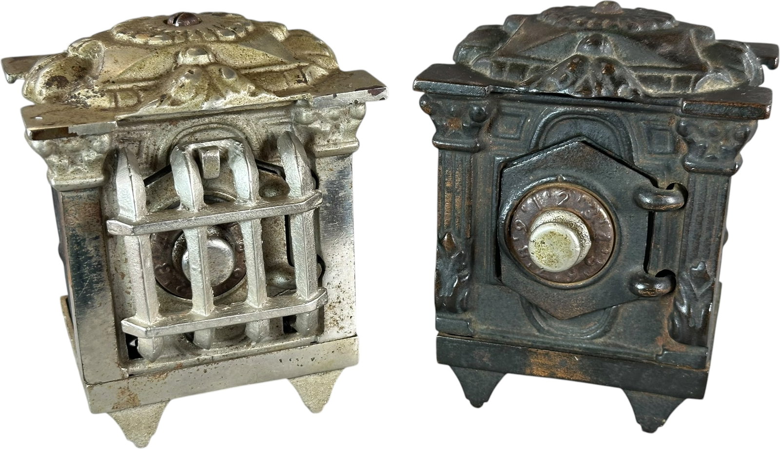 TWO HEXAGON DOOR COMBINATION SAFE BANKS: 412. TWO HEXAGON DOOR COMBINATION SAFE BANKS | Klotz, c. 1913, one with grill. | 4" h. | (Very Good to Excellent Condition) | $200 - $400