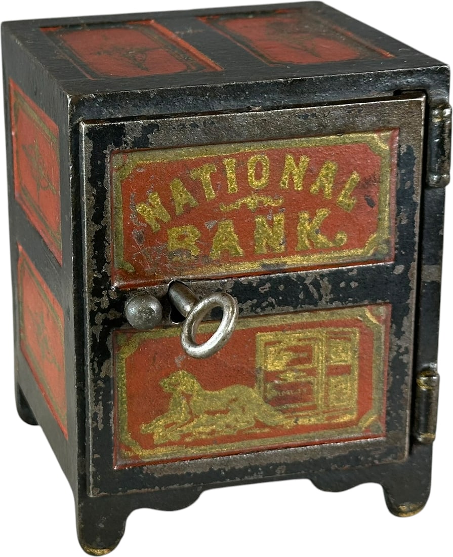 NATIONAL BANK SAFE STILL BANK: 416. NATIONAL BANK SAFE STILL BANK | Unknown maker, c. 1880.. | 4.5" h. | Outstanding stenciling at front door, (Excellent Condition) | $250 - $450