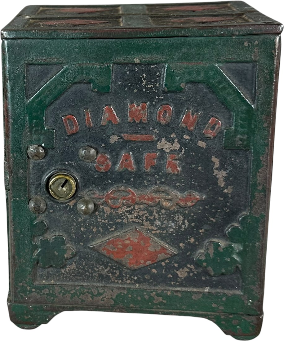 DIAMOND SAFE STILL BANK: 417. DIAMOND SAFE STILL BANK | W. Rouse & Co., Troy, NY, c. 1895. | 6.5" h. | Paint shows nice craze patina and reflects correctly under blacklight, has a folky look and could brighten with polish,