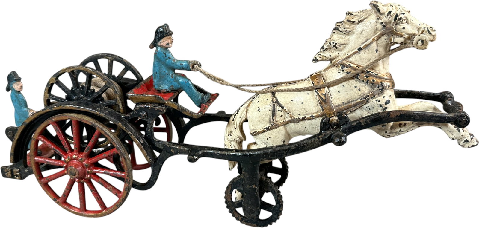 CARPENTER HORSE DRAWN HOSE REEL: 453. CARPENTER HORSE DRAWN HOSE REEL | 15" l. | Old repaint, (Very Good Condition) | $200 - $400