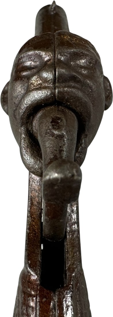 MANS HEAD ANIMATED CAP PISTOL & TWO SLINGSHOTS: 473. MANS HEAD ANIMATED CAP PISTOL & TWO SLINGSHOTS | CULTURAL DISCLAIMER: Certain antique and vintage items in this sale include imagery or themes that reflect racial stereotypes now recognized as