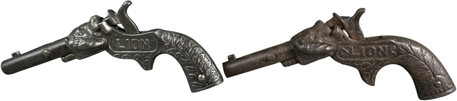 TWO LION CAP GUNS (1 of 4)