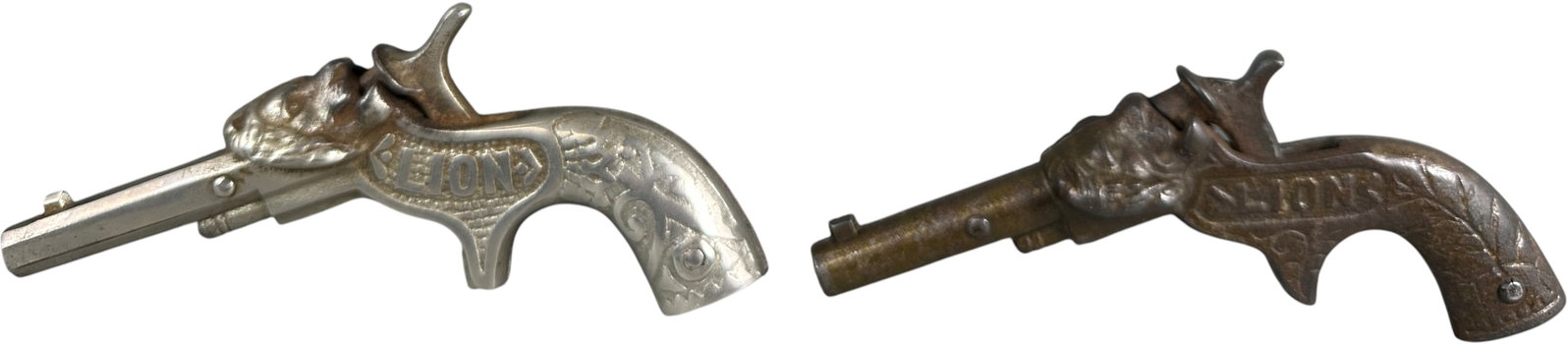 TWO LION CAP GUNS (1 of 4)