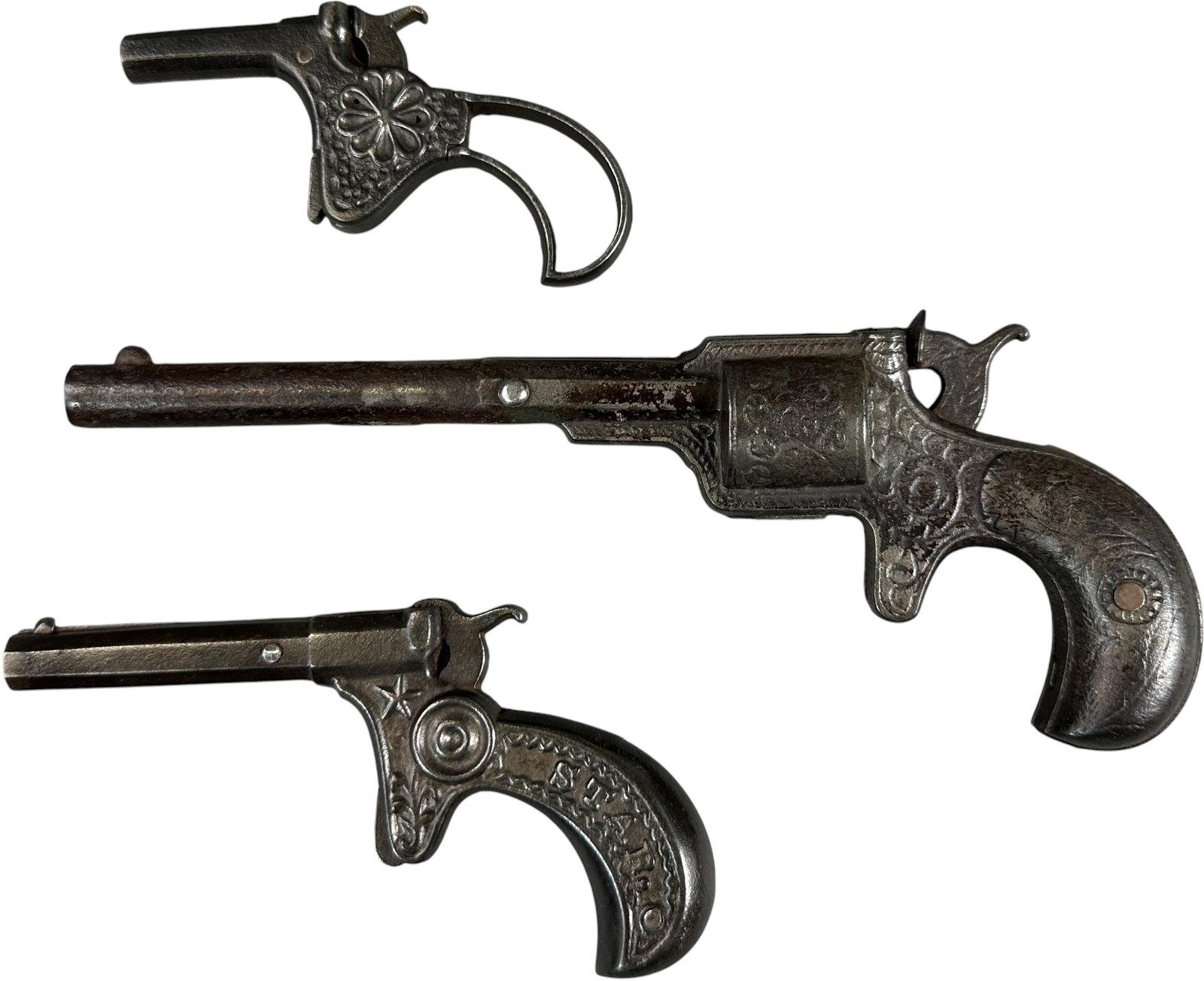 STAR, LONG BARREL AND FLOWER CAP GUNS: 492. STAR, LONG BARREL AND FLOWER CAP GUNS | 7.5" l. | (Excellent Condition) | $200 - $400