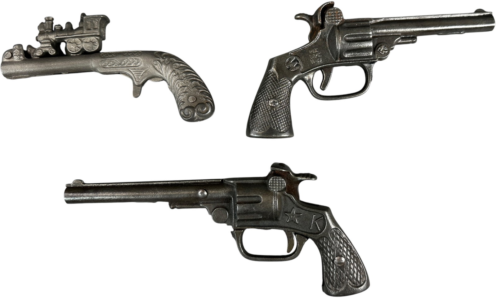 LIGHTENING EXPRESS, SENATOR AND SLICK CAP GUNS: 499. LIGHTENING EXPRESS, SENATOR AND SLICK CAP GUNS | Kenton and Stevens. | 7" l. | (Very Good to Excellent Condition) | $200 - $400