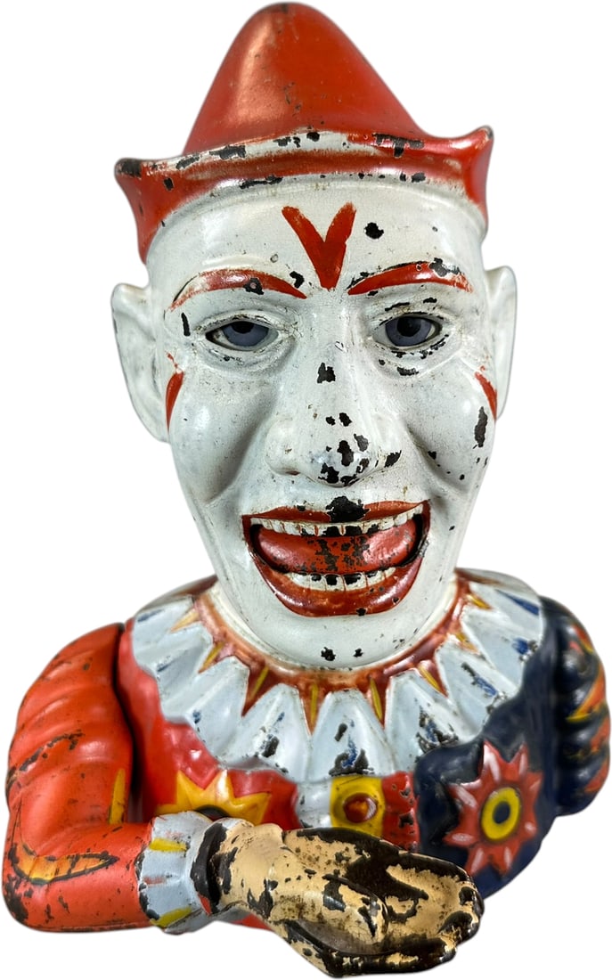 HUMPTY DUMPTY MECHANICAL BANK: 55. HUMPTY DUMPTY MECHANICAL BANK Shepard Hardware Co. Ex: Clive Devenish Collection. | 8" h. | All original with thick paint and bright colors, shows the appropriate amount of wear considering age (E