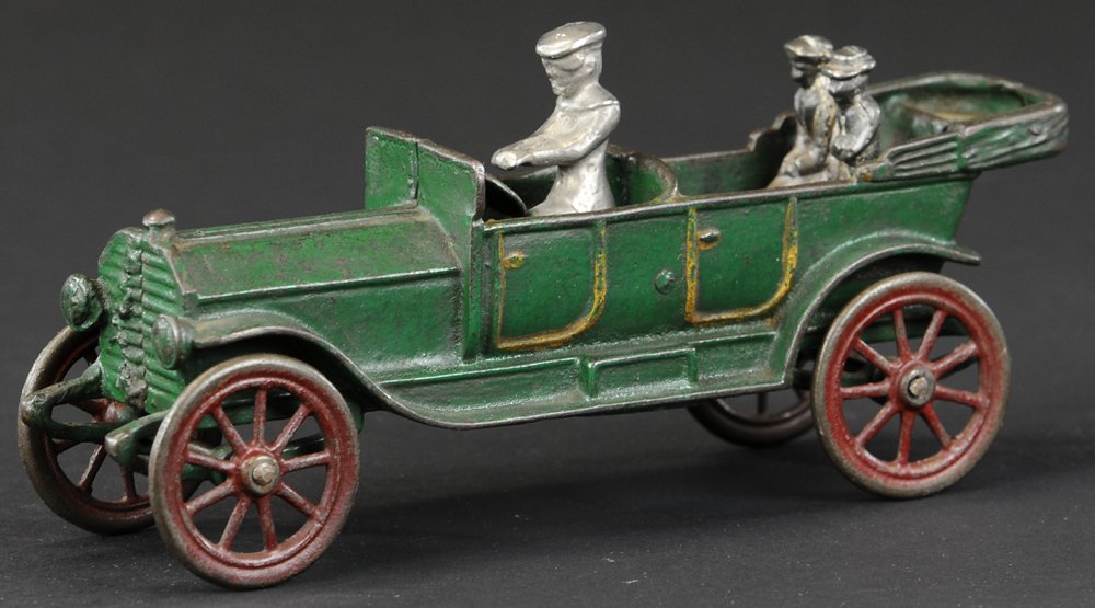 A.C. WILLIAMS TOURING CAR: c. 1920's, smaller version, cast iron, painted in green overall, well cast details, top down model, spoke wheels, front springs, headlights cast at front, full running boards, with driver & pair of re
